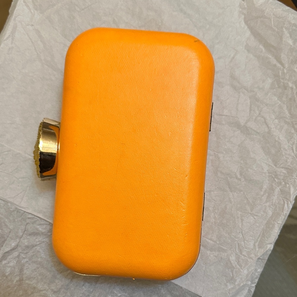 Vibrant Orange Clutch with Gold Accents
